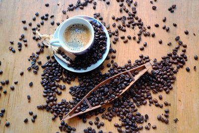 High angle view of coffee cup on table