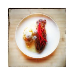 Close-up of food in plate on table