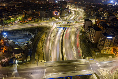 High angle view of illuminated city street at night