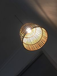 Low angle view of illuminated pendant light