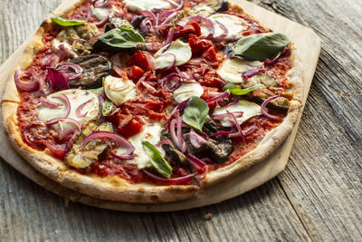 High angle view of pizza on table