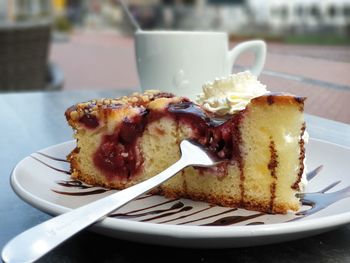 Close-up of cake in plate on table