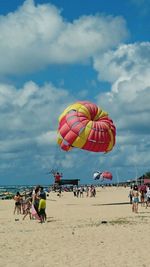 People enjoying at beach