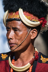 Close-up portrait of man wearing hat