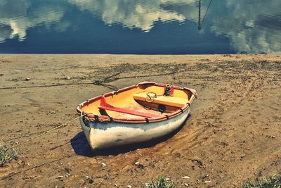 High angle view of boat moored on beach