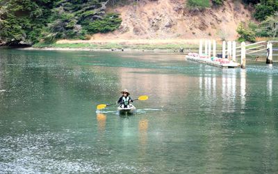 People on boat in lake