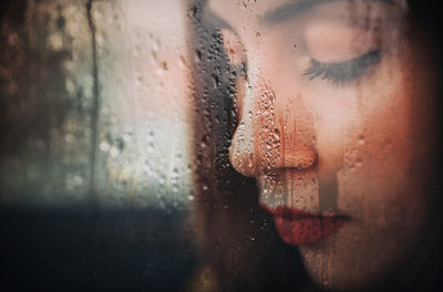 Close-up of raindrops on glass window