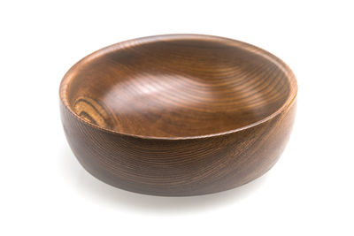 High angle view of bowl against white background