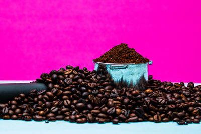 Close-up of coffee beans on table