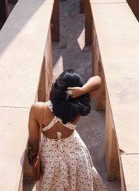 High angle view of woman on staircase