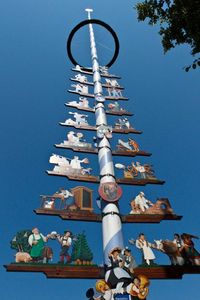 Low angle view of cross against blue sky