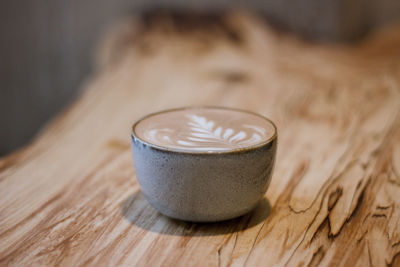 Close-up of coffee cup on table