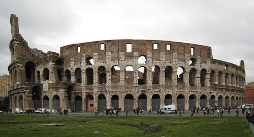 Group of people in front of historical building