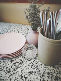 High angle view of kitchen utensils on marble