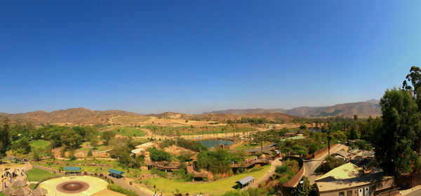 High angle view of landscape against clear blue sky