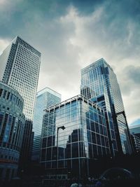 Low angle view of modern buildings against sky