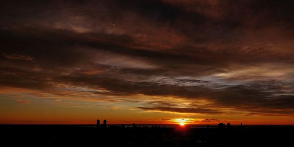 Scenic view of dramatic sky during sunset