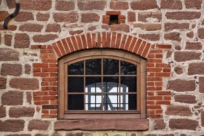 Window on stone wall