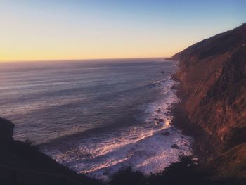 Scenic view of sea at sunset