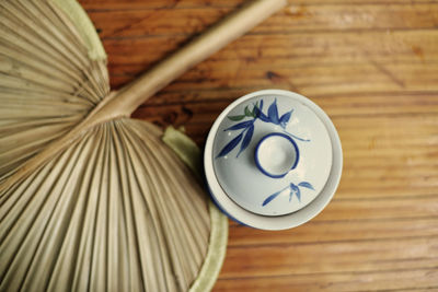 Close-up of wooden object on wooden table