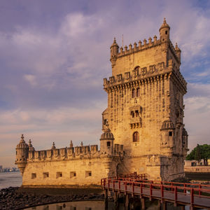 View of historic building against cloudy sky