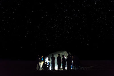 Group of people in the dark