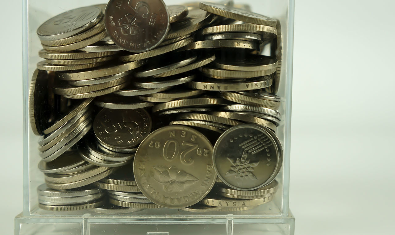 CLOSE-UP OF COINS