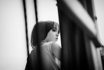 Portrait of young woman looking away