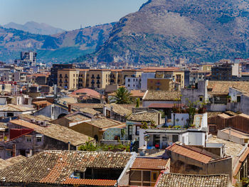 High angle view of houses against mountains