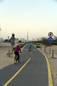 Nad al sheba bike track, dubai, uae dubai skyline from nad al sheba bicycle track road burj khalifa
