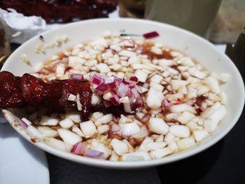 Close-up of chopped fruit salad in bowl