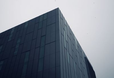 Low angle view of modern building against clear sky
