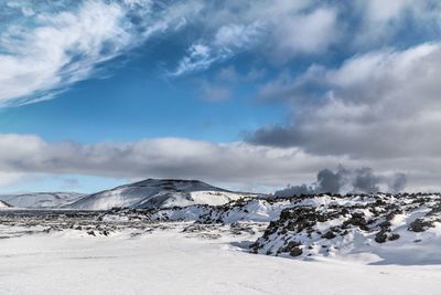 Snow covered mountain against sky