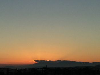 Silhouette of birds at sunset