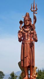 Low angle view of a statue against clear sky