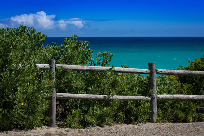 Scenic view of sea against blue sky