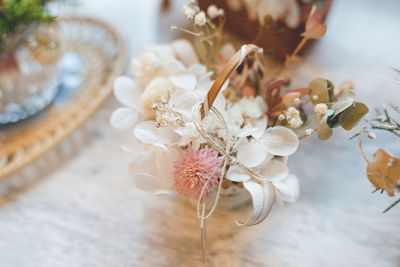 Close-up of wedding rings on table