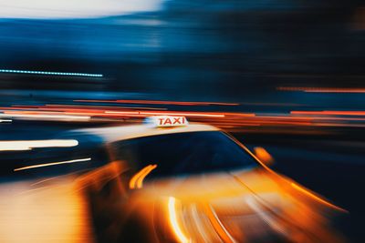 Blurred motion of taxi at night