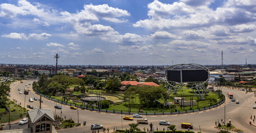 High angle view of street and buildings against sky