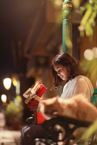 Young woman using mobile phone