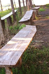 Wooden fence on grassy field