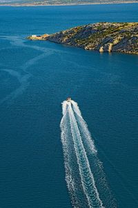 High angle view of wake in sea