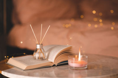 Close-up of candle on table