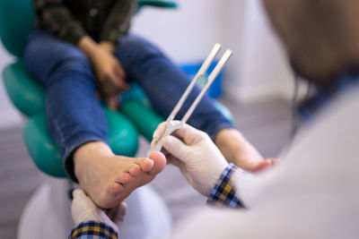 Close-up of people holding hands