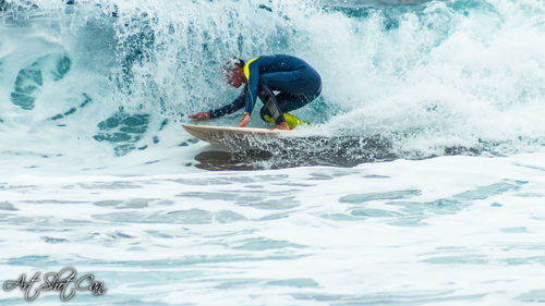 Man surfing in sea