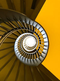 Low angle view of spiral staircase yellow architecture 