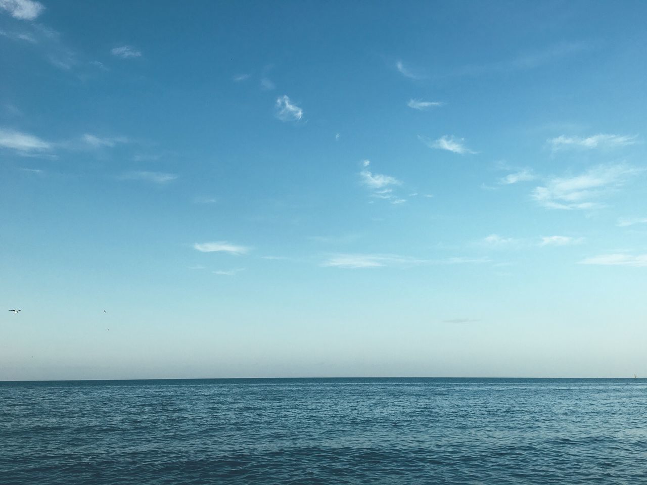 sea, water, scenics, tranquil scene, beauty in nature, horizon over water, tranquility, nature, sky, idyllic, no people, outdoors, blue, day