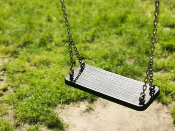 Empty swing in park