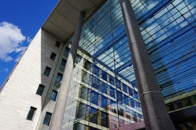 Low angle view of modern building against sky