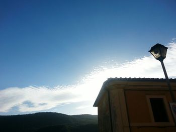 Low angle view of building against blue sky